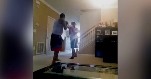 Tavis Sellers boxing with teen son