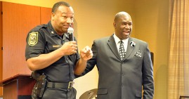 Orrin Hudson with local police officer
