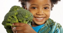 African American Girl With Broccoli