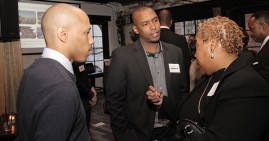 Will Moss, founder of HBCU Connect, networking with attendees to his company's event