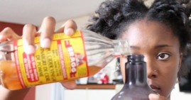 African American diabetic drinking apple cidar vinegar