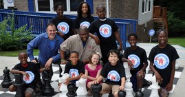 Orrin Hudson and Dr. Erik Fisher with students