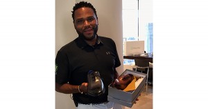 Anthony Anderson with a pair of Tuccipolo Shoes