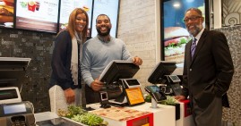 Reginald Webb, owner of 16 McDonald's franchises, and his children