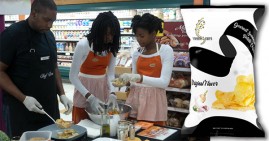 Dondre Anderson, founder of Symphony Chips, with his daughters