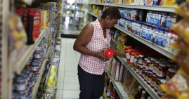 Black woman grocery shopping