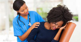 Black woman suffering from fibroids