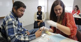 Low income man receiving healthcare