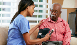 Black man getting blood pressure checked