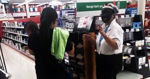 Woman with black face at Staples