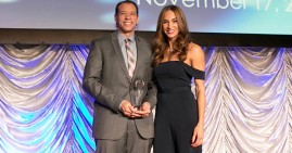 Dominique and Brian Brooks, Co-owners of E.E. Ward Moving and Storage, receive the MBE Supplier of the Year Award