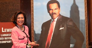 Loida Lewis with a photo of her late husband, Reginald F. Lewis