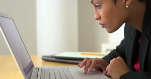 African American woman trading cryptocurrency online