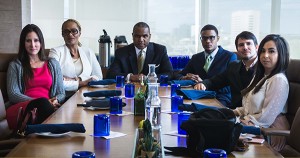 A group of minority professionals working with C.E. Hutton