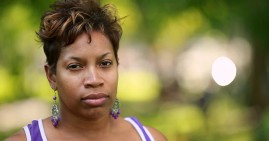 Sad and concerned African American woman