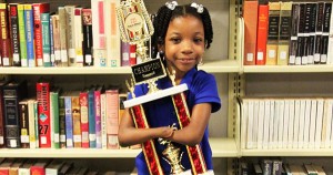 Anaya Ellick holding her award