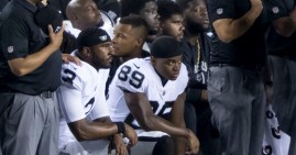 NFL players kneeling