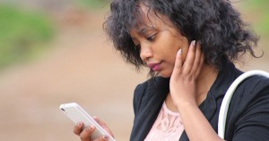 Black woman concerned about her student loans