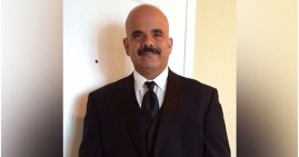 Former Police Chief Raimundo Atesiano