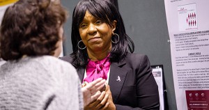 African American woman working at Susan G Komen