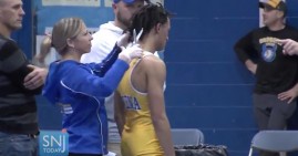 Andrew Johnson has had his locks cut minutes before a wrestling match