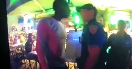 Miami Beach cop punching Black man in the face