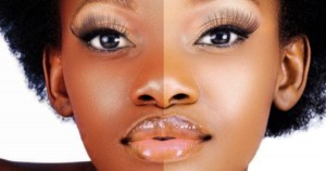 Black woman using skin whitening cream
