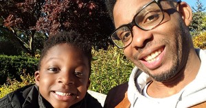 A.D. Largie, founder of Kemet Kids Publishing, with his 4-year old son