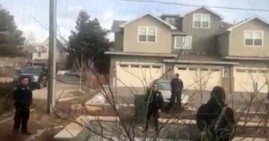 Police officers surround Black man picking up trash in Boulder, Colorado