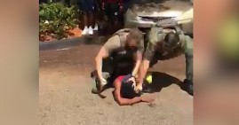 Florida police slamming Black teen's head on the ground