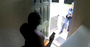 Kazeem Oyeneyin being detained by police in his home