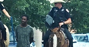 Donald Neely, Black man tied up by police on horses
