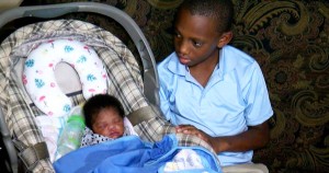 Lindell Lyons and his newborn sister