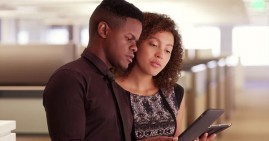 Man helping woman in debt