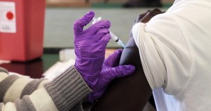 African American patient receiving a vaccination