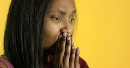 Black woman sad about stimulus check