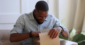 African American man receiving gift