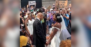 Black couple getting married during protest