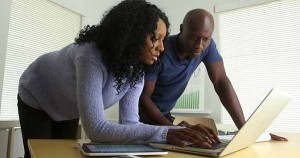 Black man and woman entrepreneurs working together