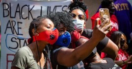 Mocha Moms protesting