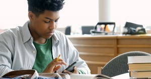 African American boy using Moxie app