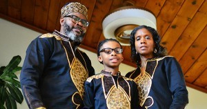 Kevon Chisholm with his wife and son