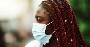 Black woman with tight braids