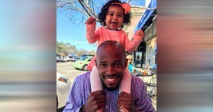 Christopher Emanuel with his daughter