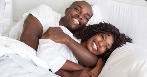 Happy Black couple dealing with ED
