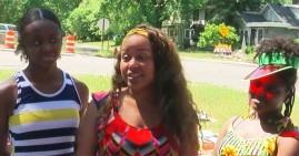 Mother and daughters at their garage sale