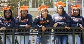 Young Black graduates from Icon Prep
