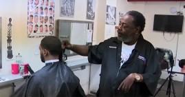 Harold Brown, one arm functioning barber