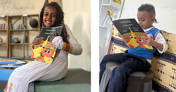 Ethiopian children reading OHBD books