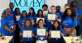 Students who participated in a jewelry diamond business training program